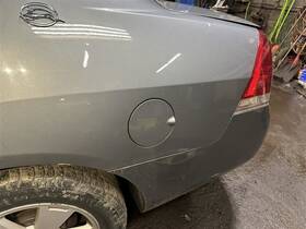 177.gm1o06 Chevrolet Impala 2006 Fuel Filler Door 913858