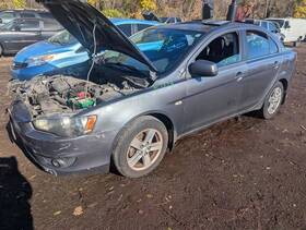 177.ms1m08 Mitsubishi Lancermit 2008 Fuel Filler Door 1752280
