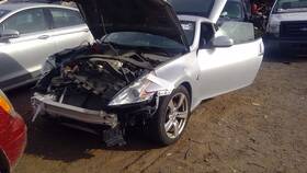177.da1u09 Nissan 370z 2009 Fuel Filler Door 1687411