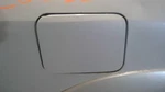 Outbakleg 2006 Fuel Filler Door 1084005. Fixed Price $60.00.