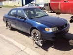 Corolla 2001 Fuel Filler Door 50999. Fixed Price $75.00.