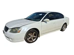 Altima 2005 Fuel Filler Door 932099. Fixed Price $69.99.