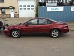 Grand Pri 2002 Fuel Filler Door 103834. Fixed Price $75.00.