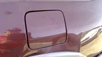 Tribute 2001 Fuel Filler Door 662452. Fixed Price $54.61.