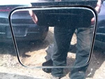 Versa 2013 Fuel Filler Door 310100. Fixed Price $45.00.