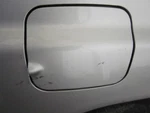 Fuel Filler Door Subaru Forester 2000 Silver 469919. Fixed Price $49.00.