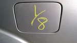 Silver Nissan Pathfindr 2006 Fuel Filler Door 791926. Fixed Price $55.00.