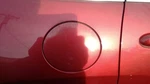 Cherokee 2014 Fuel Filler Door 2336932. Fixed Price $130.00.