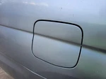 Forester 2003 Fuel Filler Door 2357694. Fixed Price $54.00.