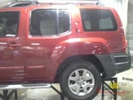 2010 Nissan Xterra Gas Fuel Filler Door Lid Cover Red. Fixed Price $90.00.