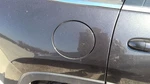 2014 - 2018 Jeep Cherokee Fuel Filler Door Gray. Fixed Price $114.10.