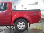 2006 Nissan Frontier Gas Fuel Filler Door Lid Cover Red. Fixed Price $90.00.