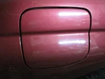 Fuel Filler Door Subaru Forester 2003 Red 481581. Fixed Price $49.99.
