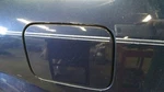Protege 2002 Fuel Filler Door 375177. Fixed Price $28.04.