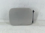 2007 Suzuki Forenza Fuel Tank Door Lid Gas Silver VK6X3. Fixed Price $42.53.