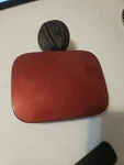Suzuki Forenza 2005-2008 Fuel Filler Door 1110710 With Cap Dark Red. Fixed Price $45.00.