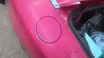Gas Miata 1992 Fuel Filler Door 1661451. Fixed Price $44.99.