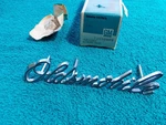 Nos Gm 1970 98 Front Grille Emblem Script Ninety Eight Oldsmobile New. Fixed Price $98.99.