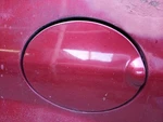 Escape 2001 Fuel Filler Door 1100078. Fixed Price $27.19.