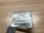 Genuine Mitsubishi Valve Fuel Filler Neck 1755A012. Fixed Price $12.00.