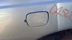 Ion 2004 Fuel Filler Door 276880. Fixed Price $60.00.