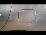 Yaris 2010 Fuel Filler Door 883800. Fixed Price $74.00.