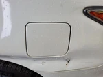 Altima 2015 Fuel Filler Door 554709. Fixed Price $87.32.