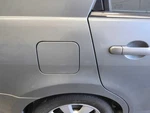 Versa 2007 Fuel Filler Door 761388. Fixed Price $87.32.