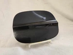2013 Ford Fusion Fuel Filler Door Lid; Tuxedo Black Metallic Uh M7204. Fixed Price $36.00.