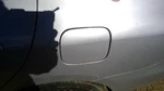 Yaris 2010 Fuel Filler Door 386270. Fixed Price $60.00.