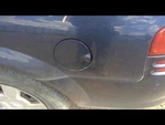 Stratus 2004 Fuel Filler Door 214419. Fixed Price $40.00.