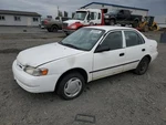 Corolla 2000 Fuel Filler Door 1380658. Fixed Price $30.00.