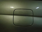 Forester 2004 Fuel Filler Door 1723774. Fixed Price $65.95.