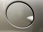 2014 Chrysler Town & Country Fuel Filler Door. Fixed Price $85.50.