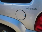 Liberty 2002 Fuel Filler Door 352236. Fixed Price $55.00.