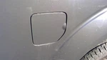 2015 Nissan Frontier Fuel Tank Door Gas Flap Grey. Fixed Price $75.00.