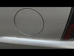 2009 Gmc Yukon Xl 1500 Fuel Filler Door. Fixed Price $75.00.