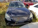 Altima 2003 Fuel Filler Door 201255. Fixed Price $75.00.