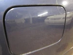 Fuel Filler Door Mazda Protege 2002 Blue 485342. Fixed Price $49.00.