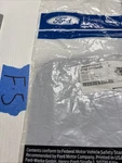Ford FT4Z-58405A26-A Fuel Door Cover Panel Fits Various Edge Models. Fixed Price $21.00.