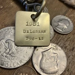 1981 De Lorean DMC-12 Brass Key Fob. Fixed Price $16.95.