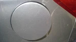 Mirage 2015 Fuel Filler Door 1081498. Fixed Price $60.00.