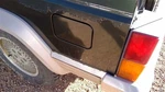 Cherokee 1995 Fuel Filler Door 273229. Fixed Price $60.00.