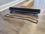 Radiator Side Tank Reservoir GM#52460884 New In Box. Fixed Price $40.00.