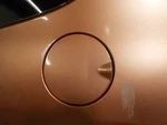 2007-08 Honda Fit Orange (YR-522M) Fuel Tank Door Oem 63910SLNA00ZZ. Fixed Price $35.00.