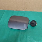 2009-2013 Toyota Corolla Fuel Tank Door Lid Gray Oem 77350-02070. Fixed Price $49.99.