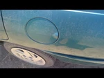 Escort 1998 Fuel Filler Door 208805. Fixed Price $40.00.